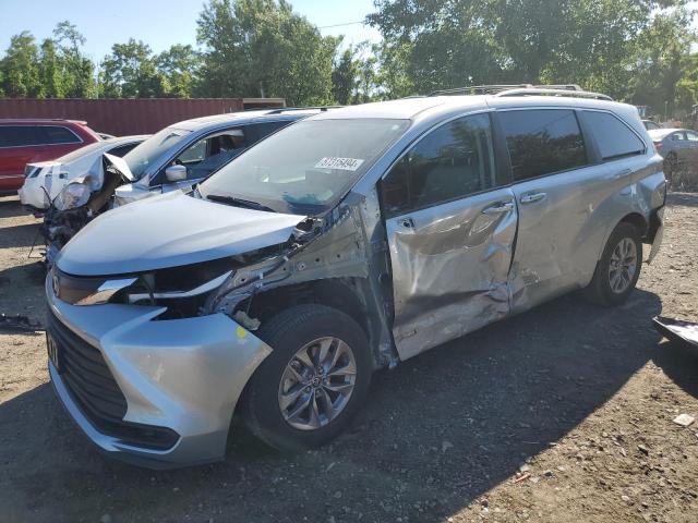 TOYOTA SIENNA LE 2021 with VIN 5TDKRKEC0MS069352 - Photo from auction