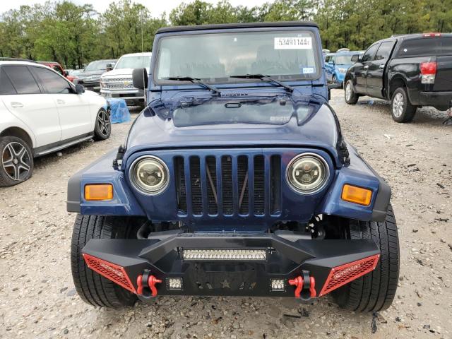 Photo 5 from auction – 2004 JEEP WRANGLER X with VIN 1J4FA39S54P739952