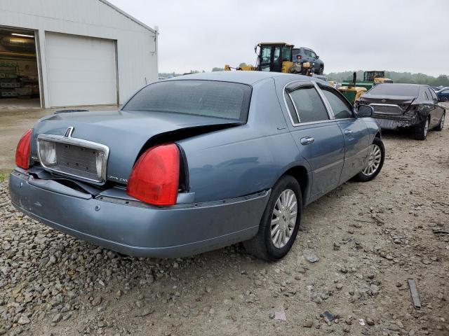 Photo 3 from auction – 2004 LINCOLN TOWN CAR E with VIN 1LNHM81W84Y686994
