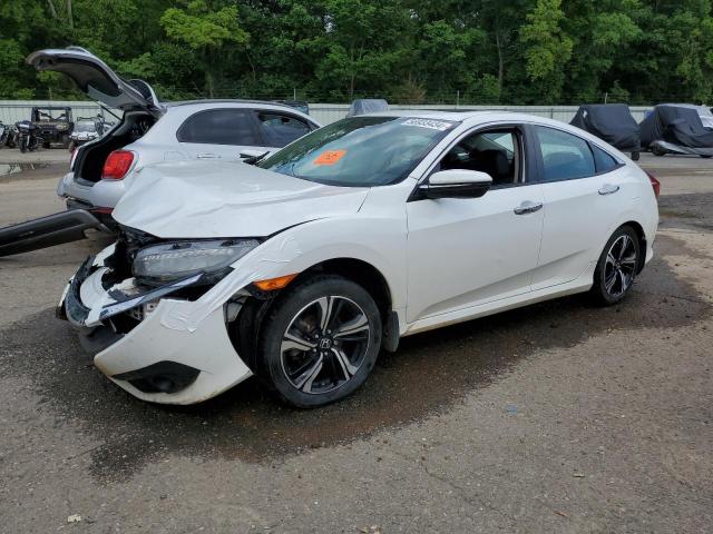 HONDA 1200 ASPEN 2016 with VIN 19XFC1F95GE006083 - Photo from auction