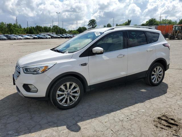 FORD ESCAPE TIT 2017 with VIN 1FMCU9J94HUB03974 - Photo from auction