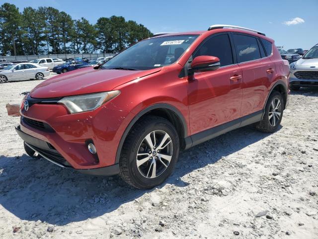 TOYOTA RAV4 XLE 2016 with VIN JTMWFREV9GJ065810 - Photo from auction