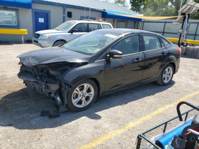 FORD FOCUS SE 2014 with VIN 1FADP3F21EL110896 - Photo from auction