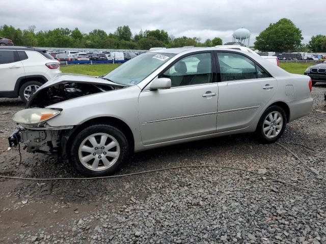 TOYOTA CAMRY LE 2004 with VIN 4T1BE30K54U896982 - Photo from auction