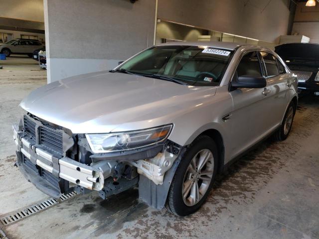 FORD TAURUS SE 2018 with VIN 1FAHP2D8XJG125807 - Photo from auction
