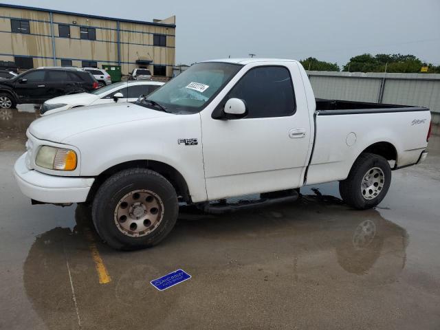 FORD F150 2002 with VIN 1FTRF17272NA63704 - Photo from auction