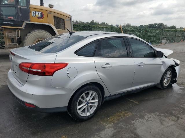 Photo 3 from auction – 2018 FORD FOCUS SE with VIN 1FADP3F22JL256153
