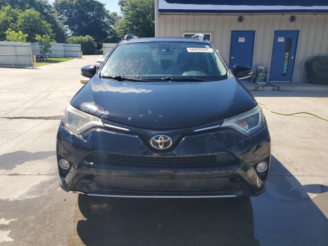Photo 5 from auction – 2017 TOYOTA RAV4 XLE with VIN 2T3RFREV4HW637155
