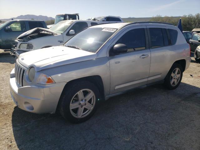 JEEP COMPASS SP 2010 with VIN 1J4NT1FA3AD621255 - Photo from auction