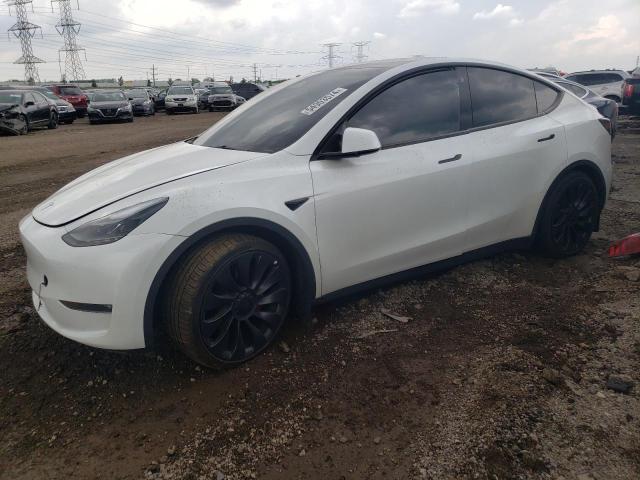 TESLA MODEL Y 2023 with VIN 7SAYGDEF9PF702335 - Photo from auction