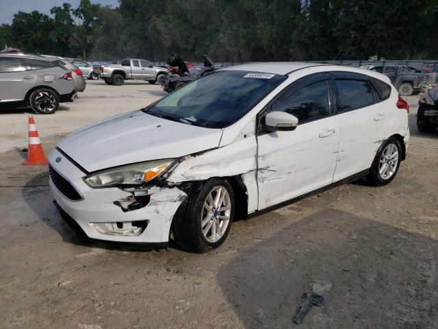 FORD FOCUS SE 2015 with VIN 1FADP3K2XFL202371 - Photo from auction