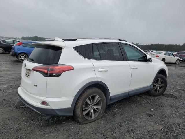Photo 3 from auction – 2017 TOYOTA RAV4 XLE with VIN 2T3WFREV6HW317287
