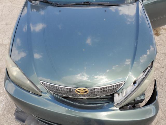 Photo 11 from auction – 2002 TOYOTA CAMRY LE with VIN JTDBF30K320087079