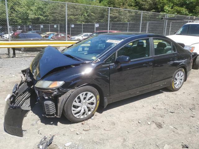 HONDA CIVIC LX 2011 with VIN 19XFA1F59BE035596 - Photo from auction