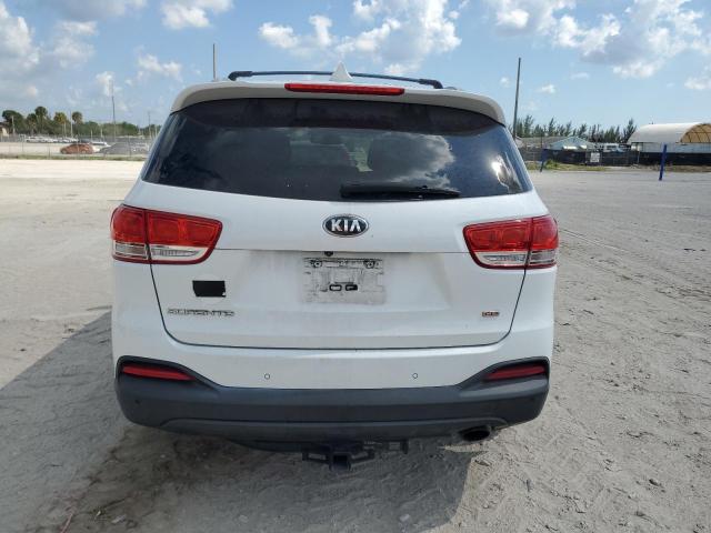 Photo 6 from auction – 2016 KIA SORENTO LX with VIN 5XYPG4A37GG115998