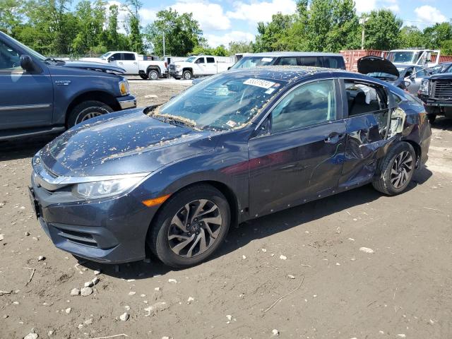 HONDA CIVIC EX 2018 with VIN 2HGFC2F76JH580029 - Photo from auction