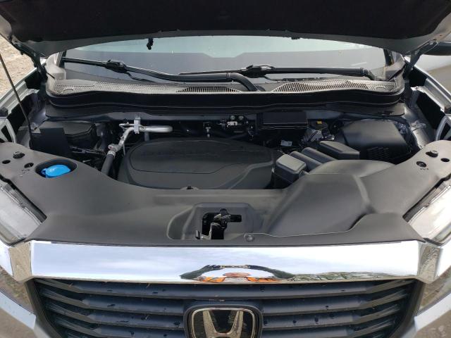 Photo 11 from auction – 2023 HONDA RIDGELINE with VIN 5FPYK3F58PB054635