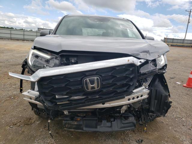 Photo 5 from auction – 2023 HONDA PASSPORT E with VIN 5FNYF8H55PB037721