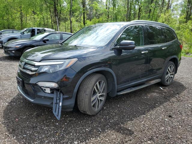 HONDA PILOT TOUR 2016 with VIN 5FNYF6H92GB505301 - Photo from auction
