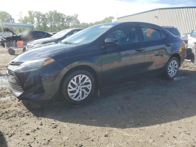 TOYOTA COROLLA L 2019 with VIN 5YFBURHE0KP858613 - Photo from auction