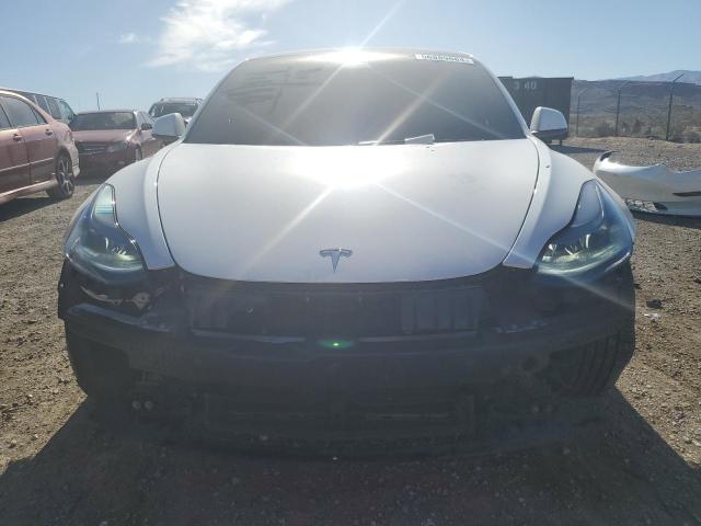 Photo 5 from auction – 2023 TESLA MODEL 3 with VIN 5YJ3E1EAXPF641657