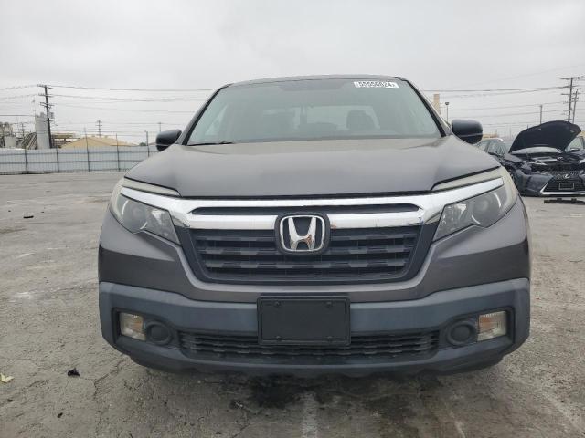 Photo 5 from auction – 2017 HONDA RIDGELINE with VIN 5FPYK2F25HB007449