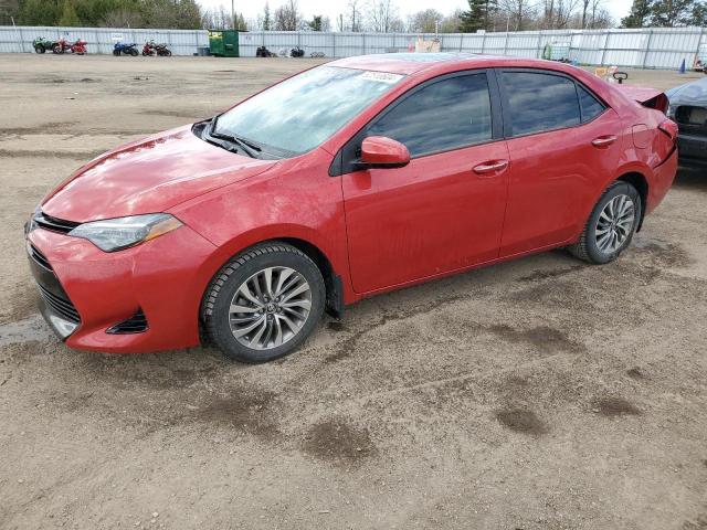 TOYOTA COROLLA L 2018 with VIN 2T1BURHEXJC121661 - Photo from auction