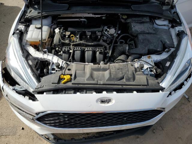 Photo 11 from auction – 2016 FORD FOCUS SE with VIN 1FADP3F28GL324772