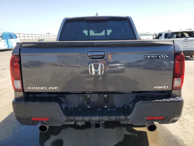Photo 6 from auction – 2023 HONDA RIDGELINE with VIN 5FPYK3F50PB016610
