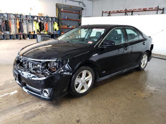 TOYOTA CAMRY HYBR 2014 with VIN 4T1BD1FKXEU134411 - Photo from auction