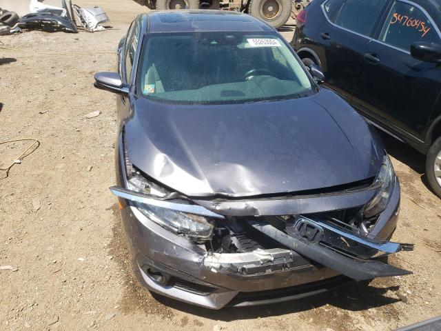 Photo 5 from auction – 2017 HONDA CIVIC TOUR with VIN 19XFC1F91HE013145