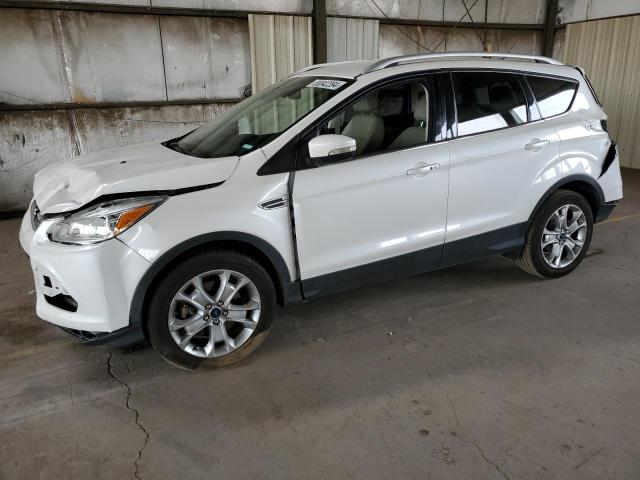 FORD ESCAPE TIT 2016 with VIN 1FMCU0J90GUB73109 - Photo from auction
