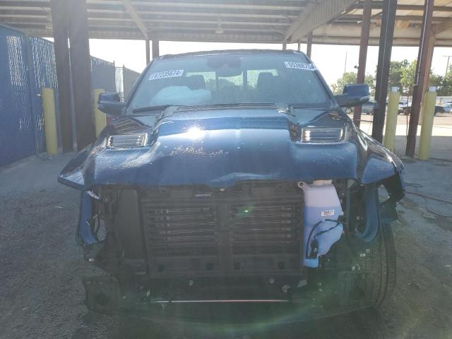 Photo 5 from auction – 2023 RAM 1500 LARAM with VIN 1C6SRFJTXPN652669