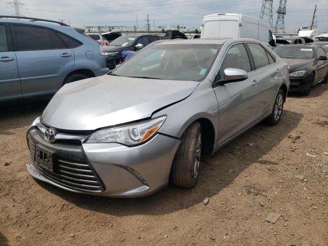 TOYOTA CAMRY LE 2017 with VIN 4T1BF1FKXHU745019 - Photo from auction
