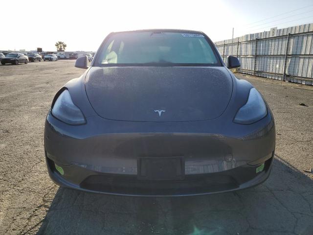 Photo 5 from auction – 2023 TESLA MODEL Y with VIN 7SAYGAEE2PF630934