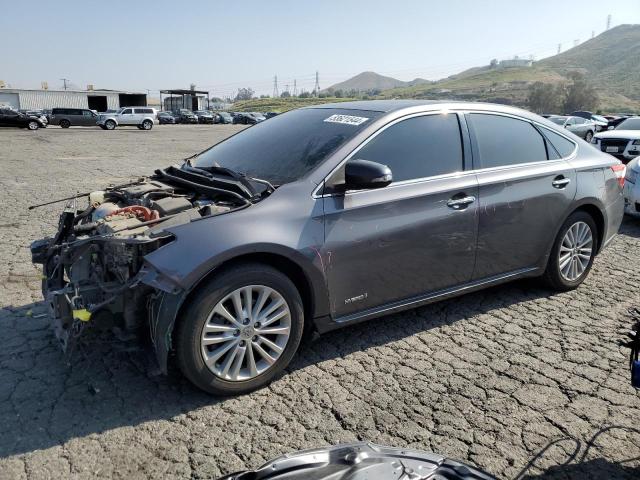 TOYOTA AVALON HYB 2014 with VIN 4T1BD1EB7EU026250 - Photo from auction