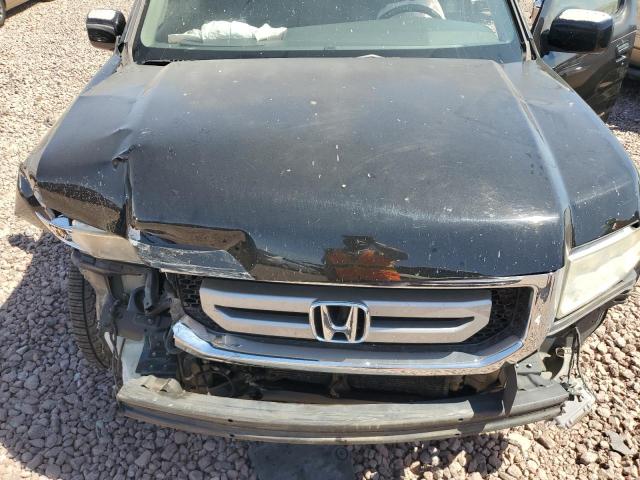 Photo 11 from auction – 2011 HONDA RIDGELINE with VIN 5FPYK1F53BB001998