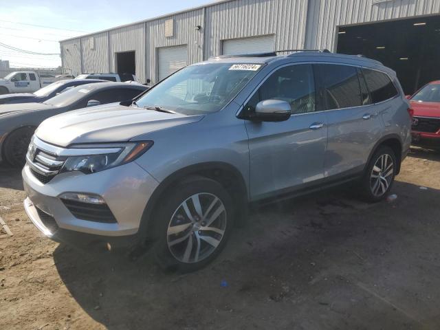 HONDA PILOT ELIT 2016 with VIN 5FNYF6H00GB112009 - Photo from auction