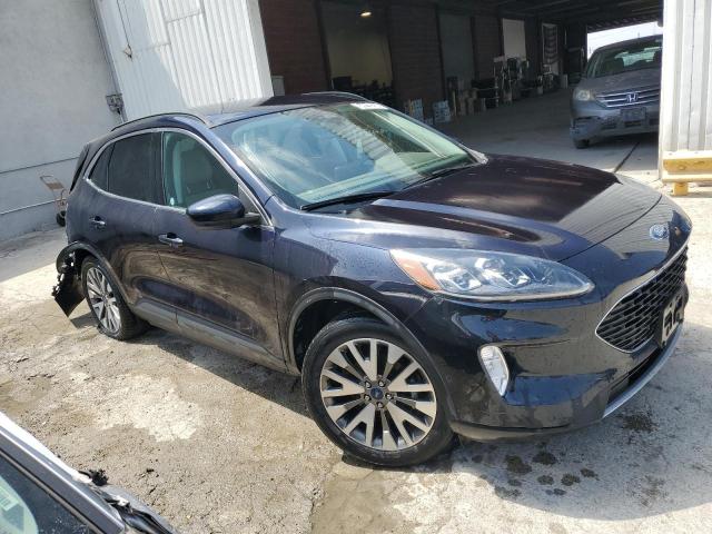 Photo 4 from auction – 2021 FORD ESCAPE TIT with VIN 1FMCU9J96MUA71121
