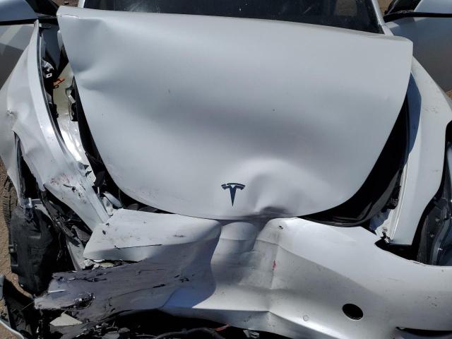 Снимка 11 от търг – 2021 TESLA MODEL 3 с VIN 5YJ3E1EB3MF063230