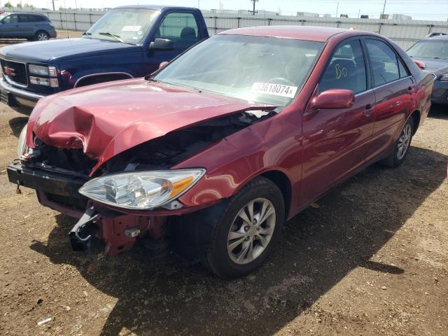 TOYOTA CAMRY LE 2004 with VIN 4T1BF30K24U079658 - Photo from auction
