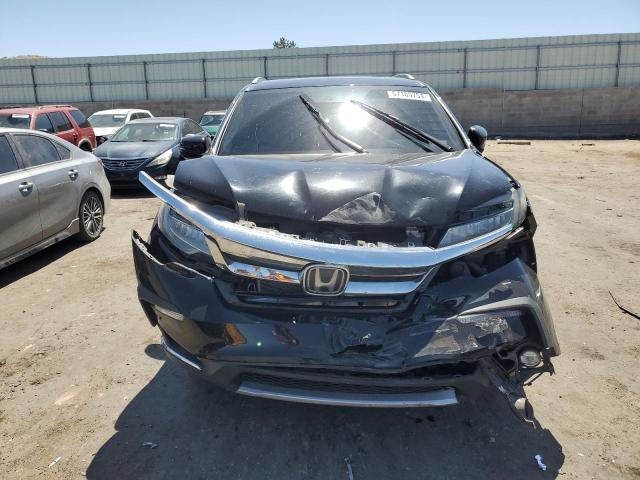 Photo 5 from auction – 2020 HONDA PILOT TOUR with VIN 5FNYF5H64LB009507