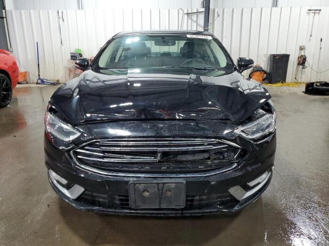 Photo 5 from auction – 2018 FORD FUSION TIT with VIN 3FA6P0D99JR234076