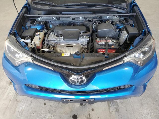 Photo 12 from auction – 2018 TOYOTA RAV4 LE with VIN JTMBFREV2JJ720489