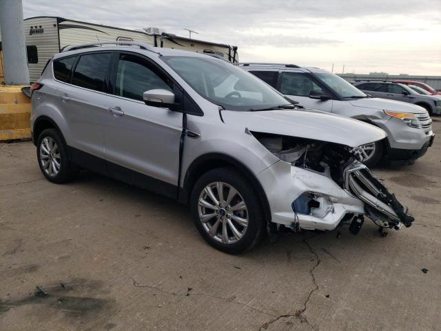 Photo 4 from auction – 2018 FORD ESCAPE TIT with VIN 1FMCU9J91JUC07022