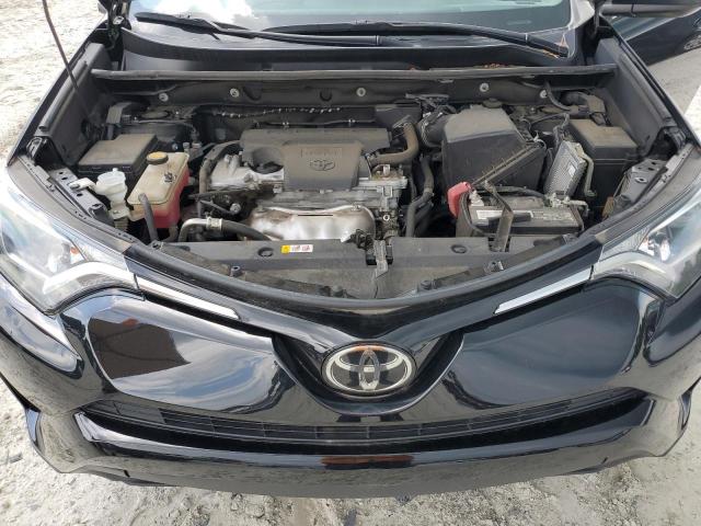 Photo 12 from auction – 2018 TOYOTA RAV4 LE with VIN 2T3ZFREV7JW497463
