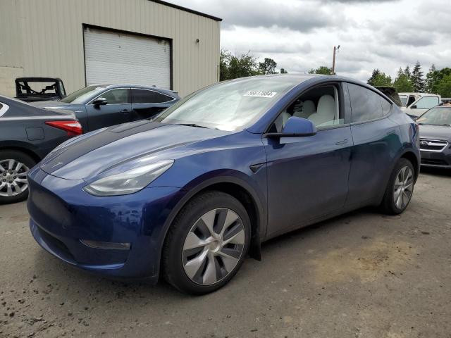 TESLA MODEL Y 2023 with VIN 7SAYGDEE7PF907143 - Photo from auction