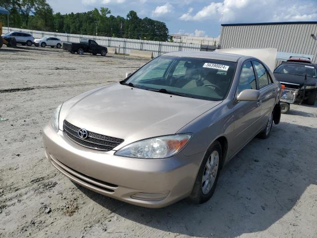 TOYOTA CAMRY LE 2004 with VIN 4T1BF32K14U574379 - Photo from auction
