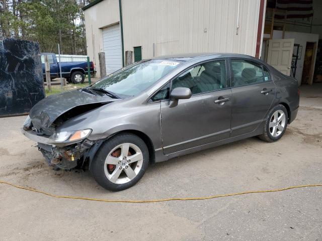 HONDA CIVIC LX 2011 with VIN 19XFA1F50BE040217 - Photo from auction