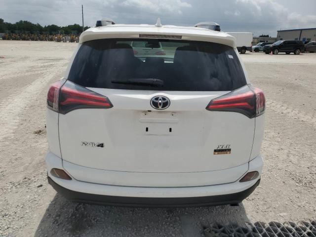 Photo 6 from auction – 2017 TOYOTA RAV4 XLE with VIN JTMWFREV7HD104362